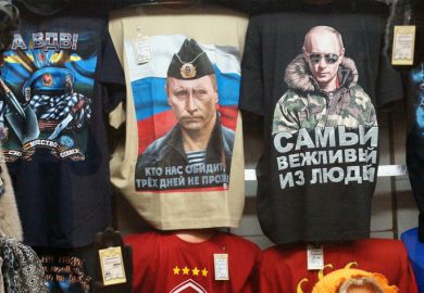 Russian president Vladimir Putin pictured on t-shirts in a Moscow shop Russian president Vladimir Putin pictured on t-shirts in a Moscow shop
