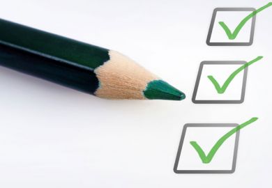 A green pencil beside ticked boxes A green pencil beside ticked boxes