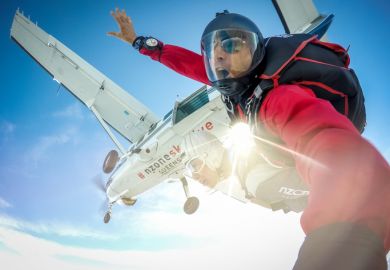 Queenstown, New Zealand - Feb 24, 2017 Skydivers are jumping from the airplane.