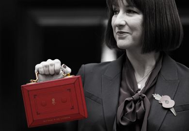 Rachel Reeves holding miniature budget case, to illustrate that universities should be looking for small wins with regards to government funding.
