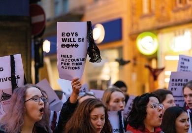 Students take part in a sexual consent protest on Cornmarket Street in Oxford