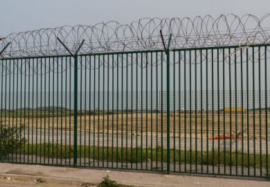 Razor wire guarding ferry terminal in Calais, France Razor wire guarding ferry terminal in Calais, France