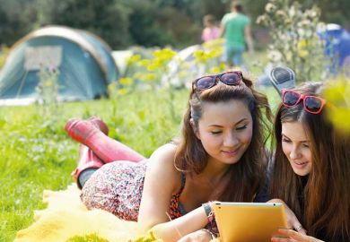 readers-using-tablet-in-field readers-using-tablet-in-field