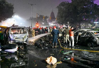 Fire Brigade personnel try to douse a fire after a blast near the Red Fort Metro Station Gate No. 1 on 10 November 2025 in New Delhi, India.