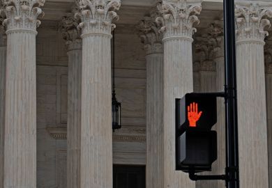 Red hand stop sign in from of classical columns to illustrate that serious abuses should stop being investigated only by universities. Red hand stop sign in from of classical columns to illustrate that serious abuses should stop being investigated only by universities.