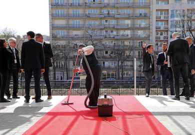 Hoovering a red carpet
