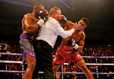 Referee punched in boxing match