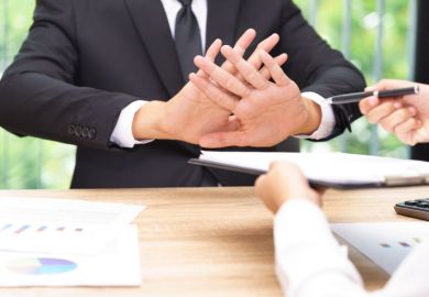 Rejection of deal, illustrating an article about open access negotiations, the HE sector, Elsevier and Jisc