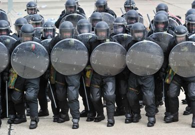 Riot police with shields