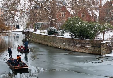 Punting down river in winter Punting down river in winter