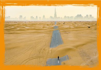 aerial view of an unidentified person walking on a deserted road covered by sand dunes in the middle of the Dubai desert.  Dubai, United Arab Emirates. aerial view of an unidentified person walking on a deserted road covered by sand dunes in the middle of the Dubai desert.  Dubai, United Arab Emirates.
