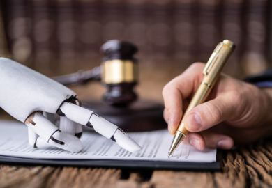 A robotic hand points to where someone should sign of a document, illustrating the role of AI in legal practice