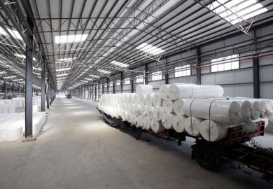 Rolls of paper loaded at paper mill