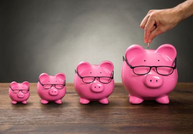 Row of increasing-sized pink piggy banks