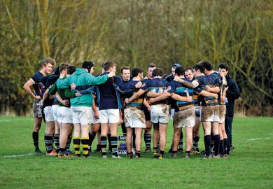Rugby team huddle