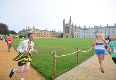 Runners at Cambridge University, illustrating that dozens of academics are chasing each research post at Oxbridge.