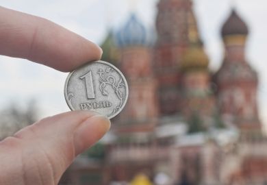 Ruble held by st.Basil's Cathedral