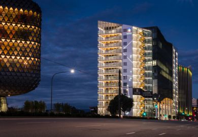 SAHMRI building and University of Adelaide building on North Terrace as the daylight fades
