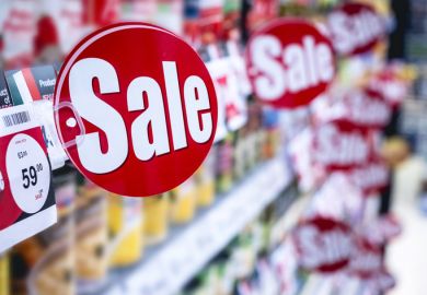 Sale sign in a supermarket Sale sign