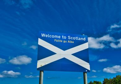 Saltire of Scotland on a sign saying 'Welcome to Scotland' Saltire of Scotland
