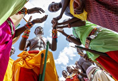 Samburu people in traditional dresses perform local dance in Samburu, Kenya