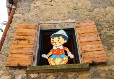 Pinocchio in the window building store of wooden toys in San Marino Pinocchio in the window building store of wooden toys in San Marino