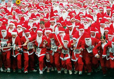 Marathon runners dressed as Santa Claus Marathon runners dressed as Santa Claus