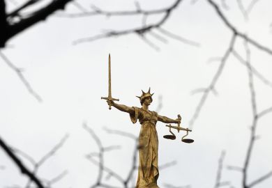 A statue of the scales of justice stands above the Old Bailey, London. To illustrate A statue of the scales of justice stands above the Old Bailey, London. To illustrate