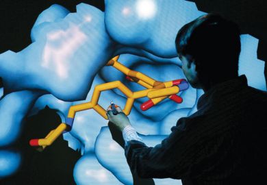 Scientist Nathan Brown moves 3D model of HSP90 protein