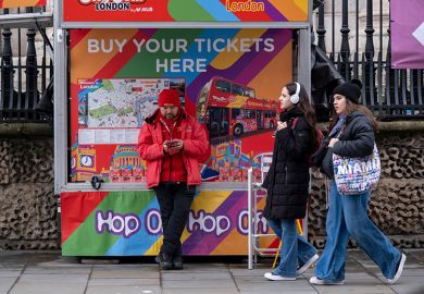 Official City Sightseeing tour bus ticket booth with tourists walking past on 19th February 2025 in London, UK. To illustrate that the Policy Exchange thinktank suggests charging a levy to foreign students, not universities. Official City Sightseeing tour bus ticket booth with tourists walking past on 19th February 2025 in London, UK. To illustrate that the Policy Exchange thinktank suggests charging a levy to foreign students, not universities.
