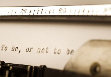 A line of Shakespeare on a piece of typewriter paper