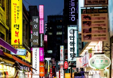 Shop signs on street in South Korea Shop signs on street in South Korea