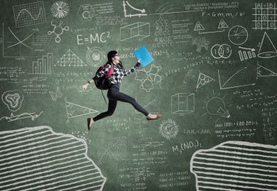 Student in front of blackboard