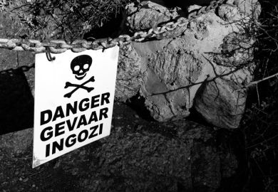 sign with the word danger written in three languages. English, Afrikaans, Zulu