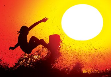 Silhouette of person surfing on wave at dawn Silhouette of person surfing on wave at dawn