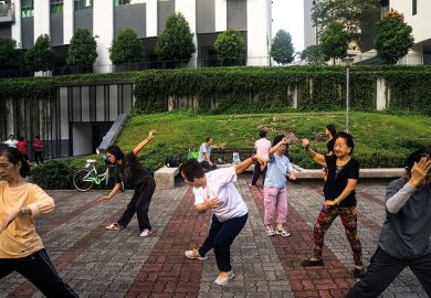 People practise tai chi in Singapore People practise tai chi in Singapore