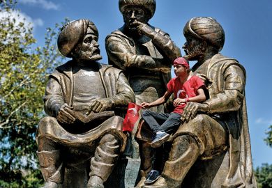 Sitting on a statue in Turkey
