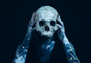 hands holding skull hands holding skull