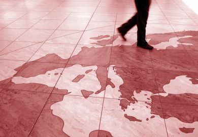 Business executive walking over Europe map on airport floor Business executive walking over Europe map on airport floor to illustrate UK warned of ‘exodus’ of research talent as ERC clock ticks