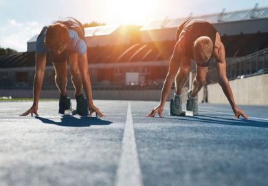 Sprinters on starting blocks at sunrise Sprinters on starting blocks at sunrise