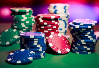 Stacks of casino chips on table