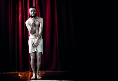 Man standing in boxer shorts on stage Man standing in boxer shorts on stage illustrating feature article about worst university teaching moments