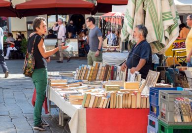 Discussion at bookstall in market