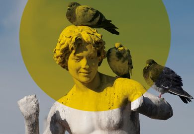 Statue covered in pigeons