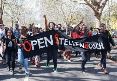 Students hold banners during a demonstration against Stellenbosch University in Cape Town, 2015. Students hold banners during a demonstration against Stellenbosch University in Cape Town, 2015.