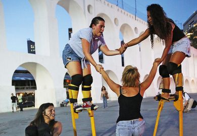 Group of women on stilts
