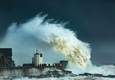 Huge wave crashes on pier Huge wave crashes on pier