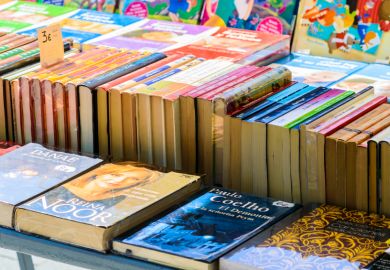 Browsing books Books sold at a street market