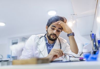 Stressed male doctor