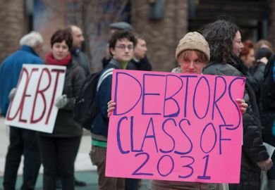 Student demonstrators holding 'Debtors class of 2031' sign